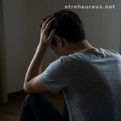 Person seen from behind holding head suggesting confusion and fatigue
